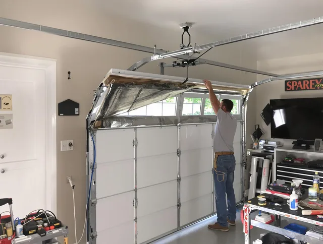 Garage door section replacement by Downey Garage Door Repair in Downey