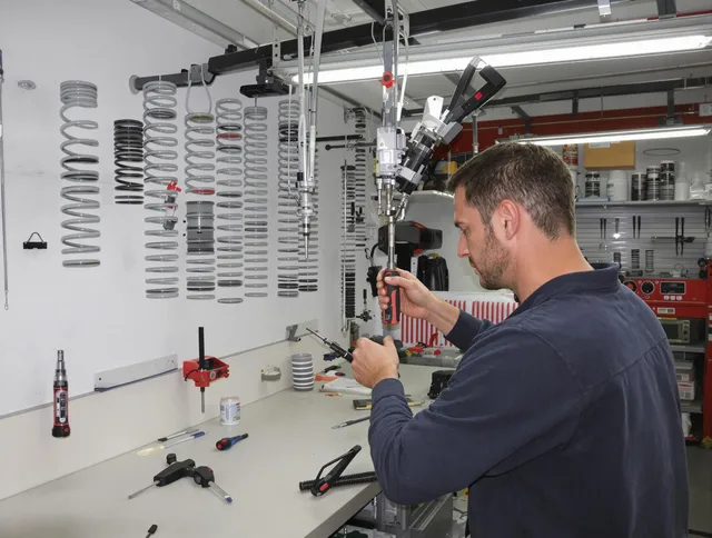 Downey Garage Door Repair safety certified technician performing precision spring replacement in Downey