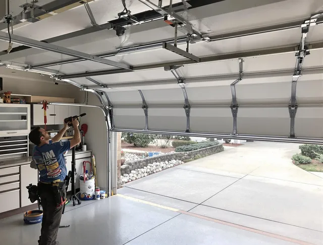 Garage door track repair service by Downey Garage Door Repair in Downey